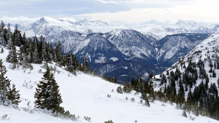 Fototapeta na wymiar Windy weather in the Alps in the winter by Hochkar. Beautiful landscape.
