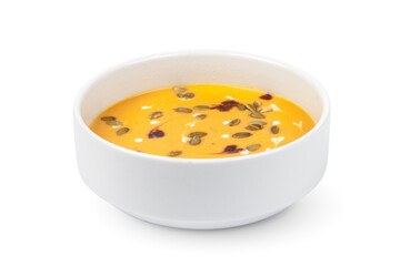 Bowl of pumpkin soup isolated on white