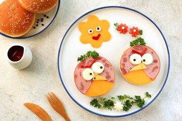 Sandwiches with hum and cheese. Funny food for kids'.