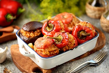 Tomatoes, eggplant and bell peppers stuffed with rice and minced meat, baked in the oven. Organic healthy food.