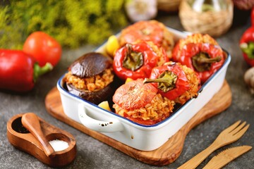Tomatoes, eggplant and bell peppers stuffed with rice and minced meat, baked in the oven. Organic healthy food.