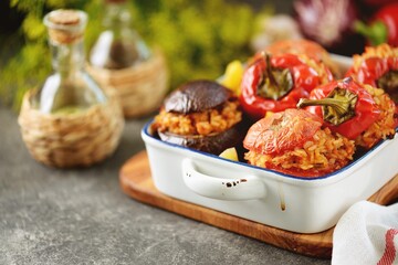 Tomatoes, eggplant and bell peppers stuffed with rice and minced meat, baked in the oven. Organic healthy food.