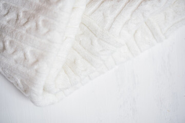 White Knitted Fabric Texture.Knitting, handmade.