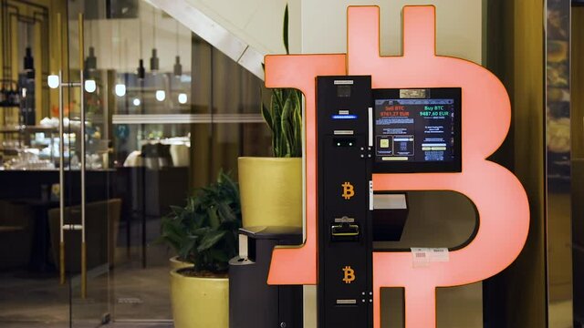 Bitcoin ATM machine in mall for cryptocurrency exchange