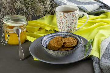 oatmeal cookies and a cap of tea