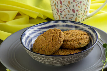 oatmeal cookies and a cap of tea
