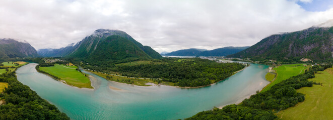 Plakat Aerial drone view of Rauma river, mountains and Andalsnes city