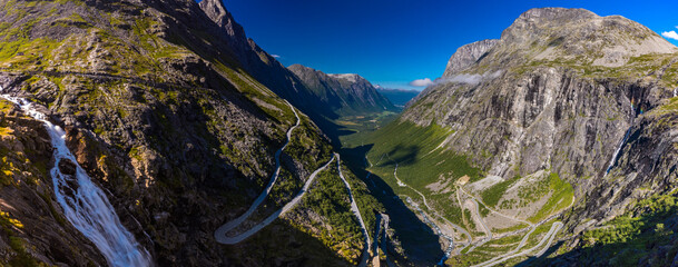 Trollstigen or Trolls Path is a serpentine mountain road in Norway