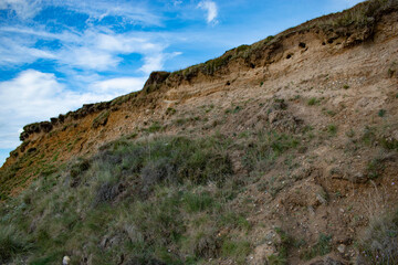 landslide on cliff, clay and sand