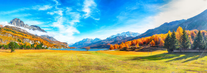 Charming autumn scene in Swiss Alps and views of Sils Lake (Silsersee).