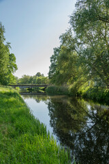 Fototapeta na wymiar Rural Landscape With River In North Germany
