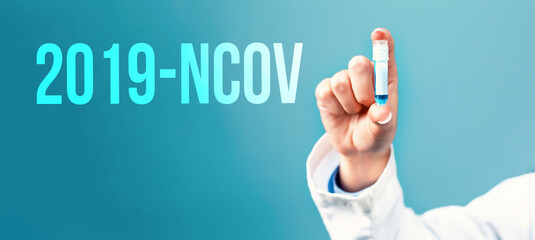 2019-NCOV theme with a doctor holding a laboratory vial on a blue background