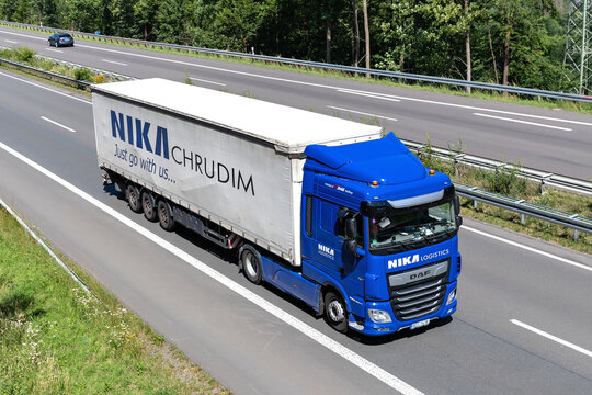 WIEHL, GERMANY - JUNE 25, 2020: NIKA DAF XF truck with curtainside trailer on motorway.