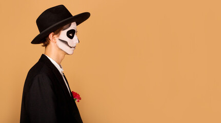 Closeup profile photo of spooky scary undead guy look empty space serious prepare fight other creatures wear white shirt rose death costume suspenders isolated gray color background