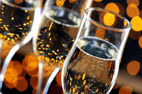 Close up photo of Champagne glasses against bokeh background