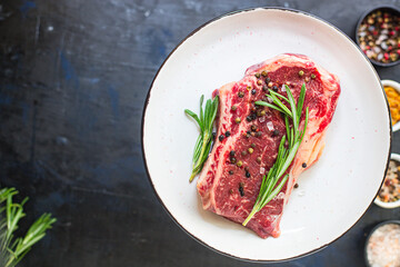 raw steak rib eye meat beef juicy on the table serving size second course top view copy space for text food background rustic