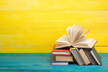Books on wooden desk table and abstract background. Education background. Copy Space. Back to school.