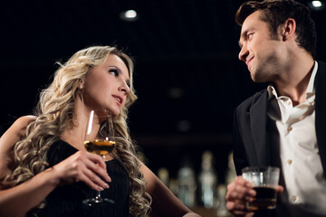 a man meets a beautiful blonde at the bar.