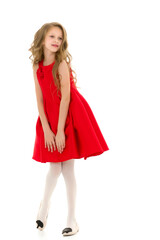 Full Length Portrait of Pretty Preteen Girl Standing Looking to Side.