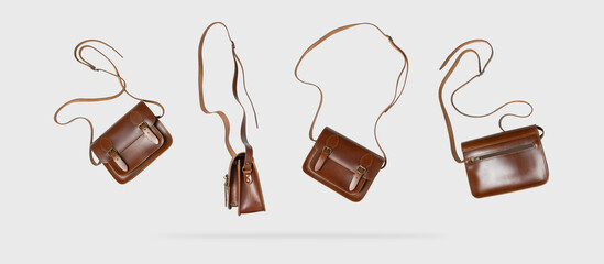 Brown leather ladies bag from different sides on a gray background. Creative background with flying...