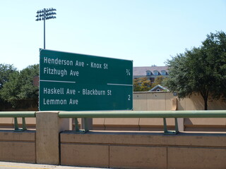 This sign just beyond the George Bush Presidential Center also carries the name Geo Bush Expressway for these exits from SMU to Uptown district