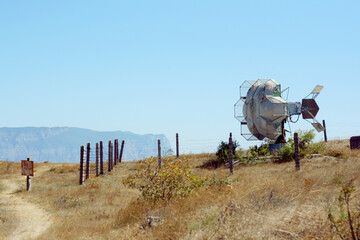 Abandoned military radar antenna in the mountains