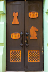 Stylish themed entrance door to the chess club building