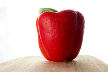 fresh red pepper on wood