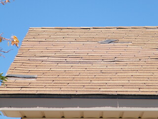 Roof Shingle Damage from Wind.