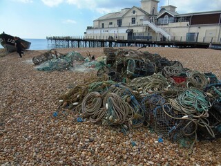 fishing nets and boat on the beach