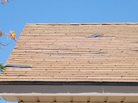 Roof Shingle Damage From Wind.