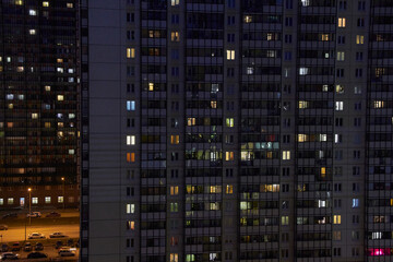 Fototapeta na wymiar night view from the high-rise residential building in city sleeping area