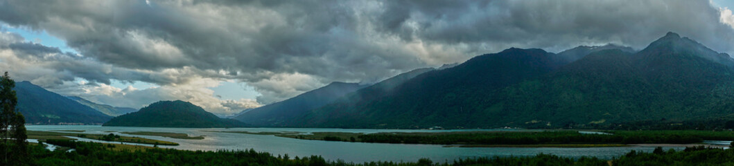 Panoramic shot of Llanguihue lake and stormy sky. Puerto Varas. Chile.