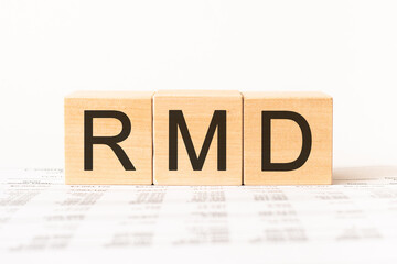 Word rmd. Wooden small cubes with letters isolated on white background with copy space available.Business Concept image.