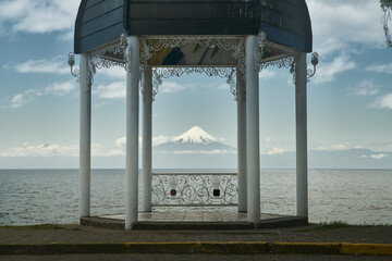 Frutillar Jetty view and town at Llanquihue lake and Osorno Volcano. Puerto Varas, Chile, South America.