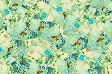 2000 Kazakhstani tenge bills lies in big pile. Rich life conceptual background