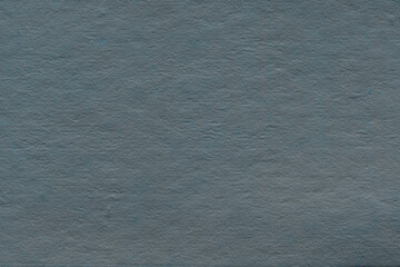 Vintage and old looking paper background. Colored blue retro book cover. Ancient book page.