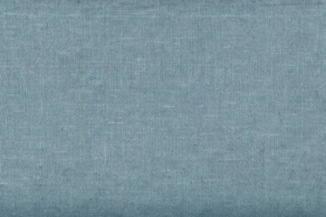 Vintage and old looking paper background. Colored blue retro book cover. Ancient book page.