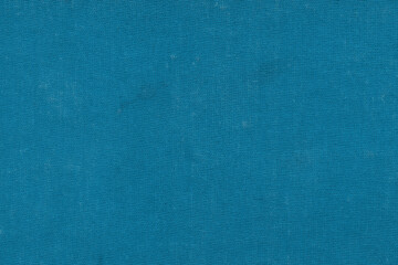 Vintage and old looking paper background. Colored blue retro book cover. Ancient book page.