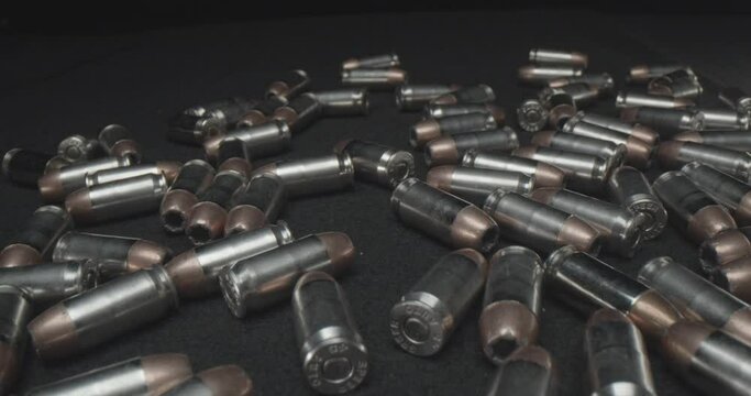 45 caliber ammo spread out on table