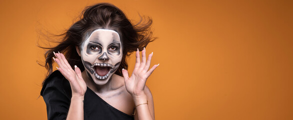 Woman with halloween skull makeup