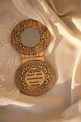 pocket mirror made of birch bark
