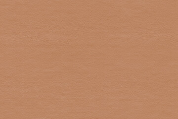 Fototapeta premium Vintage and old looking paper background. Colored orange with a brown retro book cover. Ancient book page.