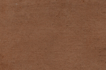 Vintage and old looking paper background. Colored orange with a brown retro book cover. Ancient book page.