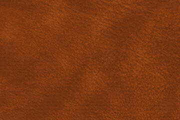 Vintage and old looking paper background. Colored orange with a brown retro book cover. Ancient book page.