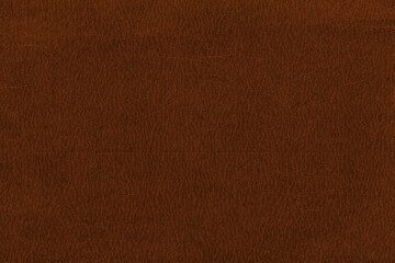 Vintage and old looking paper background. Colored orange with a brown retro book cover. Ancient book page.