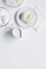 Healthy food concept with milk on white table top view mock-up