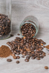 a cup on the table with coffee beans