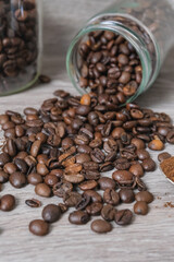 a cup on the table with coffee beans