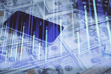 Double exposure of forex graph drawing over us dollars bill background. Concept of financial markets.